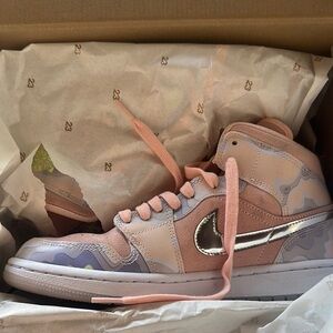 Pink Nike Air Jordan mid
